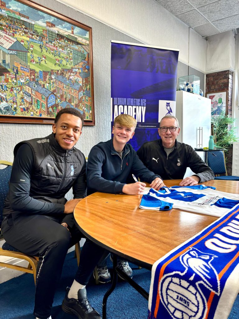 Will Godfrey-Bourne signing for Oldham Athletic